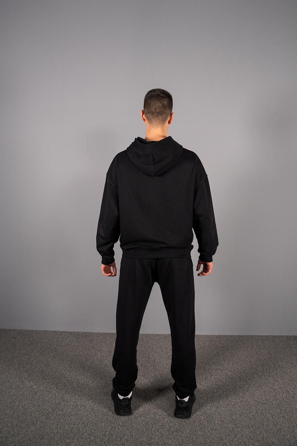 THE unisex loose black hoodie - do we